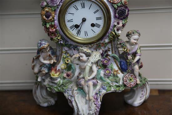 A late 19th century German porcelain mantel clock, 18in.